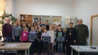 Хабаровский священник посетил турнир среди школьников по нанайским шашкам "Апокачи"